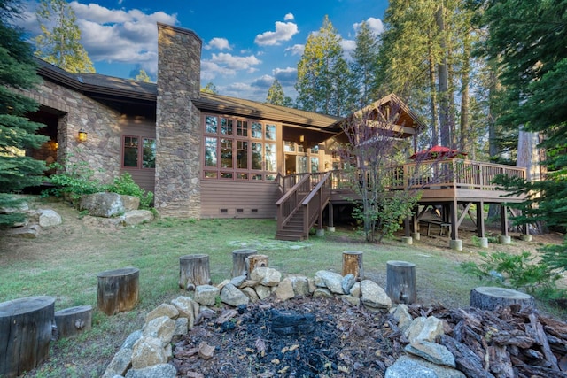 39516 Littleridge Rd, Shaver Lake, CA 93664 - rear view of property with crawl space, stairway, a wooden deck, a chimney, and a lawn