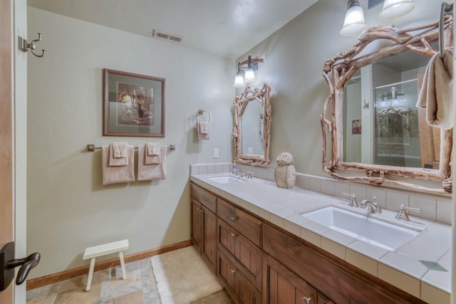 39516 Littleridge Rd, Shaver Lake, CA 93664 - full bath featuring double vanity, a stall shower, and baseboards