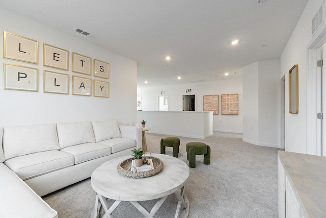 4433 N Phoenix, Fresno, CA 93723 - living area featuring light colored carpet, recessed lighting, and baseboards