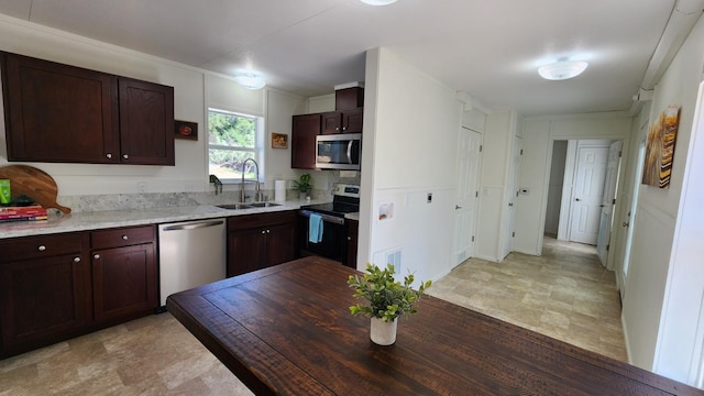55062 Oak Crest Ct, Wishon, CA 93669 - kitchen with stainless steel appliances, a sink, and dark brown cabinetry