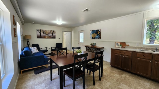 55062 Oak Crest Ct, Wishon, CA 93669 - dining space featuring healthy amount of natural light