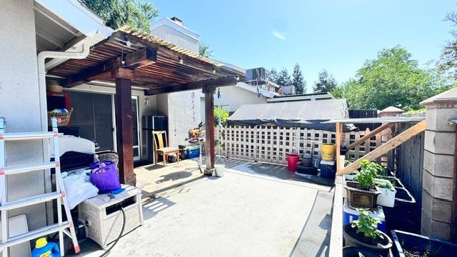 5455 N Marty Ave Unit 111, Fresno, CA 93711 - view of patio with a pergola