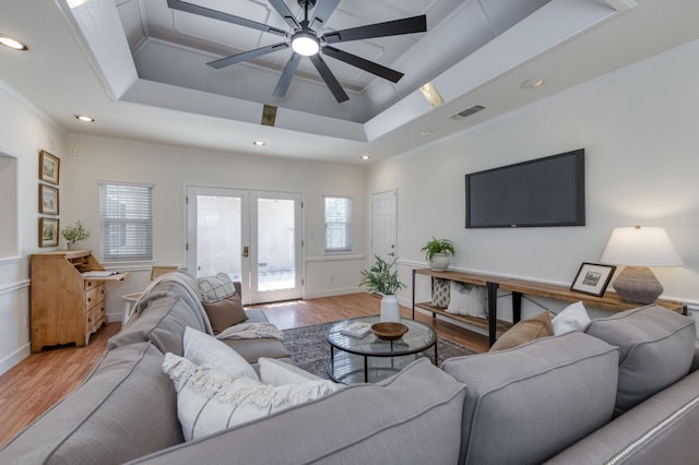 5753 N 7th St, Fresno, CA 93710 - living room with wood finished floors, french doors, ceiling fan, crown molding, and baseboards