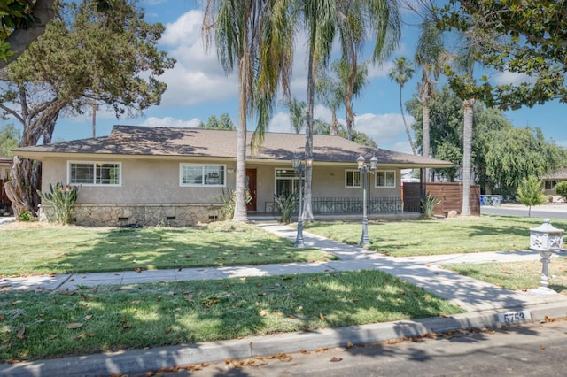 5753 N 7th St, Fresno, CA 93710 - ranch-style house with stucco siding and covered porch