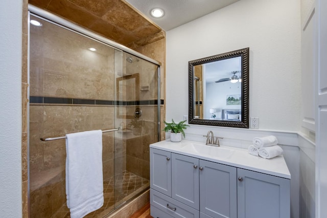 5753 N 7th St, Fresno, CA 93710 - full bathroom with vanity and a stall shower