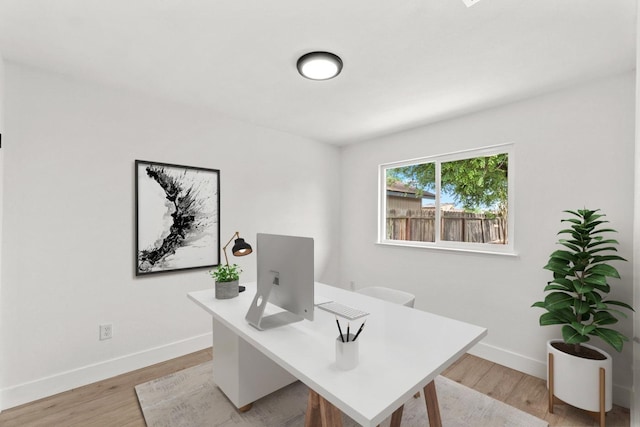 1406 Harris Ct, Fowler, CA 93625 - office area with baseboards and light wood finished floors