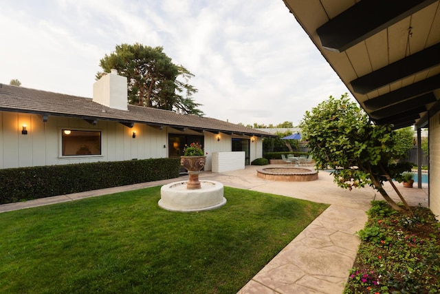 2331 W Celeste Ave, Fresno, CA 93711 - view of green lawn with a patio
