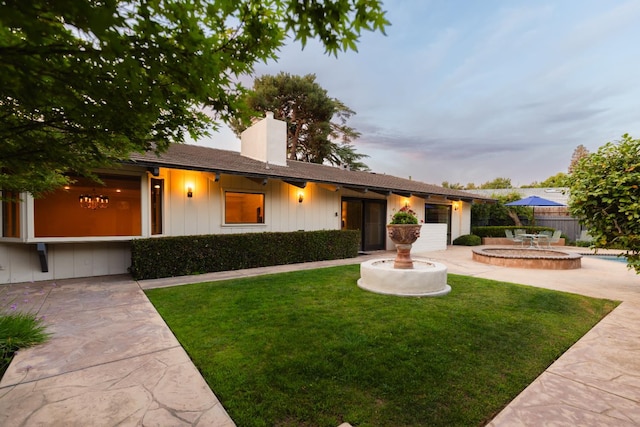 2331 W Celeste Ave, Fresno, CA 93711 - ranch-style home with a patio and a chimney
