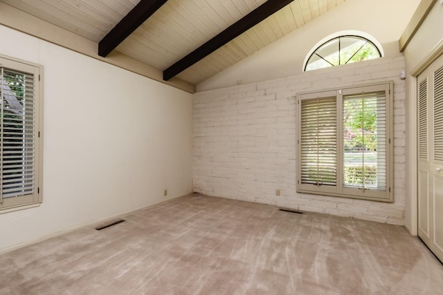 2331 W Celeste Ave, Fresno, CA 93711 - carpeted empty room with wooden ceiling and brick wall