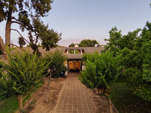 2331 W Celeste Ave, Fresno, CA 93711 - view of front of house featuring a chimney and a tile roof