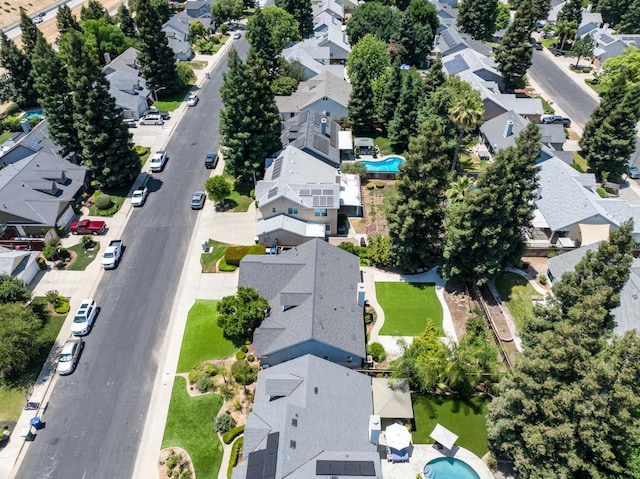 2173 Spruce, Clovis, CA 93611 - aerial view of property's location with nearby suburban area and a pool