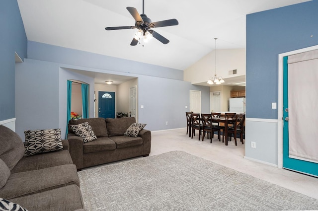 2173 Spruce, Clovis, CA 93611 - living area with light colored carpet, a ceiling fan, a chandelier, high vaulted ceiling, and baseboards
