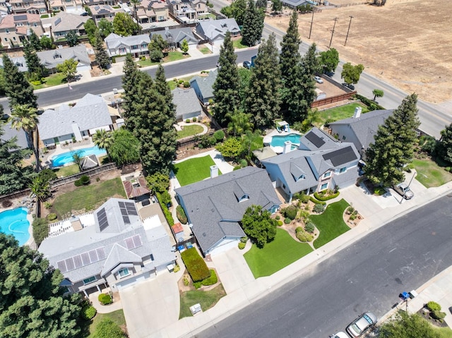 2173 Spruce, Clovis, CA 93611 - aerial perspective of suburban area with a pool area