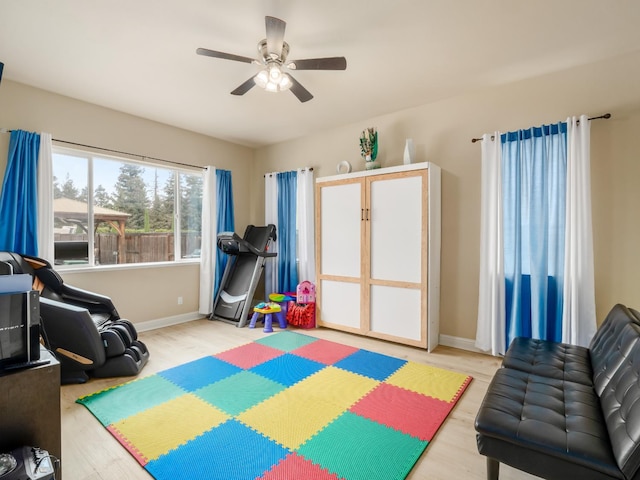2127 Chennault Ave, Clovis, CA 93611 - exercise area with light wood-type flooring, ceiling fan, and baseboards