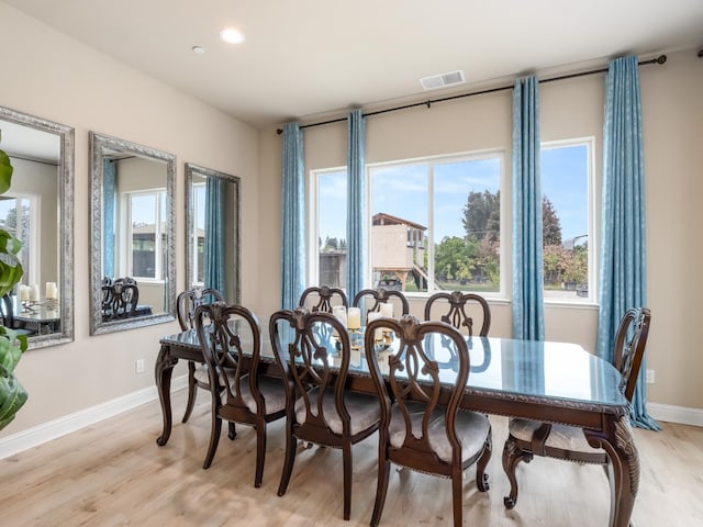 2127 Chennault Ave, Clovis, CA 93611 - dining space featuring light wood-style floors, baseboards, and recessed lighting