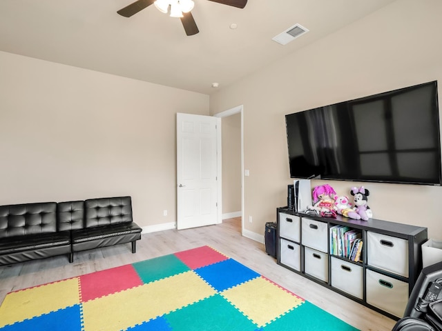 2127 Chennault Ave, Clovis, CA 93611 - game room with ceiling fan, wood finished floors, and baseboards