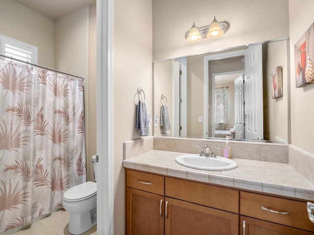2127 Chennault Ave, Clovis, CA 93611 - bathroom featuring vanity, toilet, a shower with curtain, and tile patterned flooring