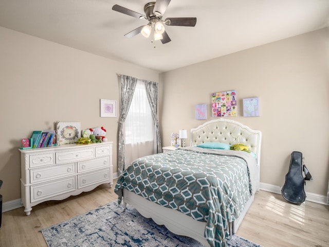2127 Chennault Ave, Clovis, CA 93611 - bedroom featuring light wood-style flooring, baseboards, and a ceiling fan