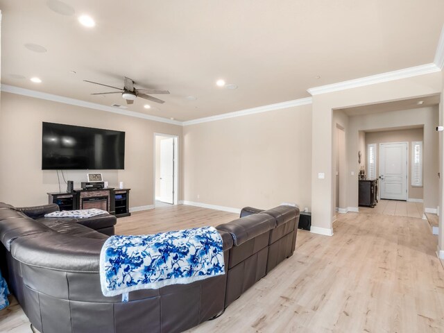 2127 Chennault Ave, Clovis, CA 93611 - living area featuring a ceiling fan, light wood finished floors, recessed lighting, baseboards, and ornamental molding