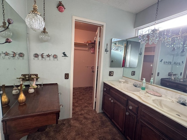 32101 E Trimmer Springs Rd, Sanger, CA 93657 - bathroom with double vanity and a spacious closet
