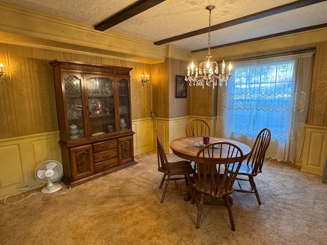 32101 E Trimmer Springs Rd, Sanger, CA 93657 - dining area with a chandelier, beamed ceiling, light carpet, a textured ceiling, and a decorative wall