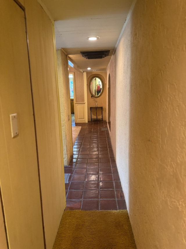 32101 E Trimmer Springs Rd, Sanger, CA 93657 - hall with a textured wall and dark tile patterned floors