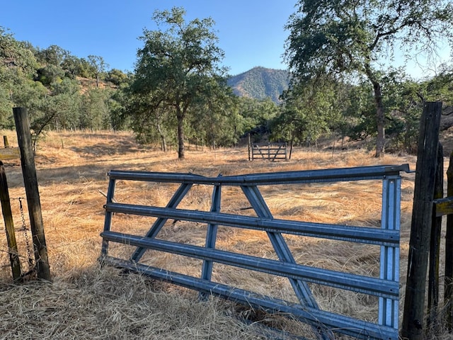 32101 E Trimmer Springs Rd, Sanger, CA 93657 - gate with a mountain view and a view of countryside