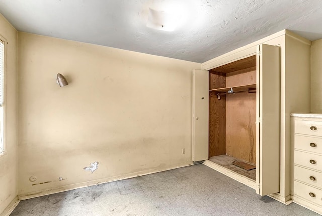 5495 E Atchison St, Fresno, CA 93727 - unfurnished bedroom featuring baseboards and a closet