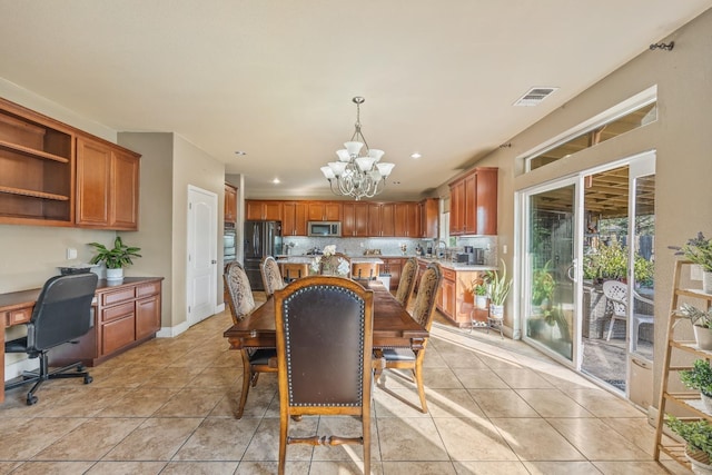 3615 W Sunnyview Ave NW, Visalia, CA 93291 - dining room featuring a chandelier, a desk, light tile patterned floors, and recessed lighting