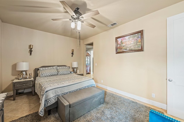 3615 W Sunnyview Ave NW, Visalia, CA 93291 - bedroom with light tile patterned flooring, a ceiling fan, and baseboards