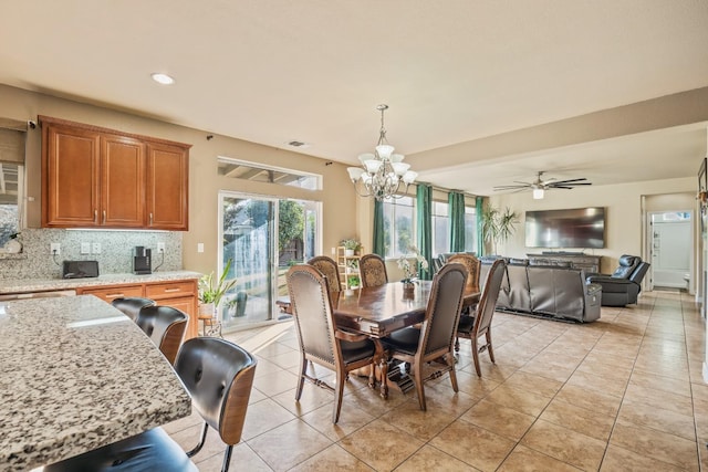 3615 W Sunnyview Ave NW, Visalia, CA 93291 - dining space featuring a chandelier, light tile patterned floors, and recessed lighting