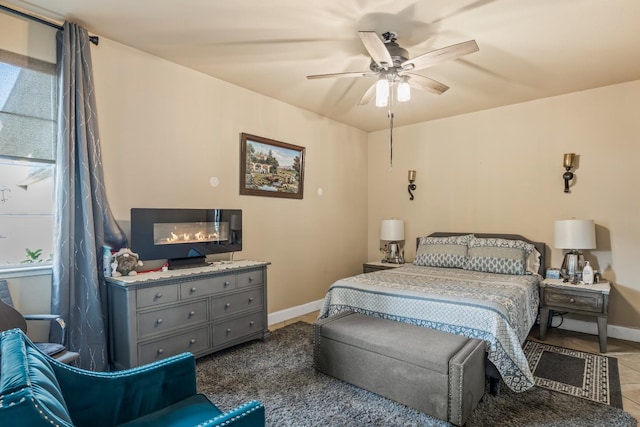 3615 W Sunnyview Ave NW, Visalia, CA 93291 - tiled bedroom featuring baseboards and ceiling fan