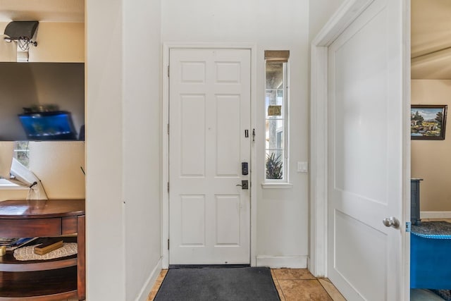 3615 W Sunnyview Ave NW, Visalia, CA 93291 - foyer entrance featuring baseboards and light tile patterned floors
