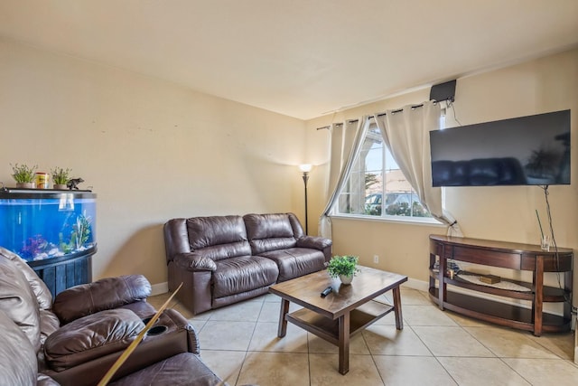 3615 W Sunnyview Ave NW, Visalia, CA 93291 - living area featuring light tile patterned flooring and baseboards
