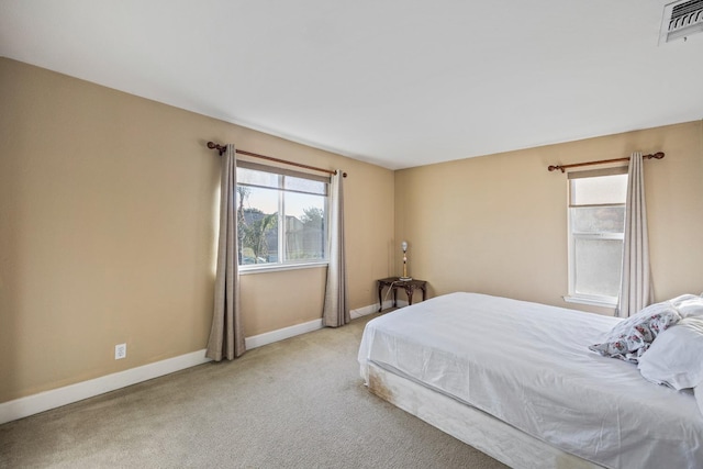 3615 W Sunnyview Ave NW, Visalia, CA 93291 - bedroom featuring baseboards and light colored carpet