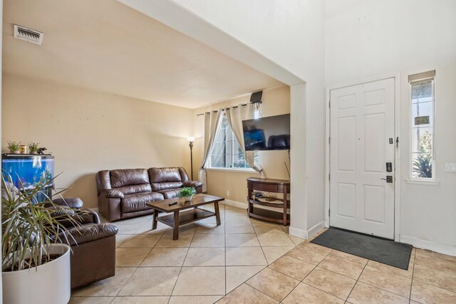 3615 W Sunnyview Ave NW, Visalia, CA 93291 - foyer entrance with light tile patterned flooring and baseboards