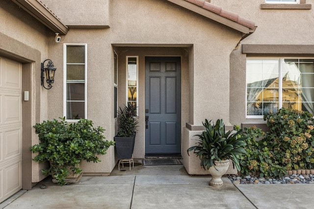 3615 W Sunnyview Ave NW, Visalia, CA 93291 - doorway to property featuring stucco siding
