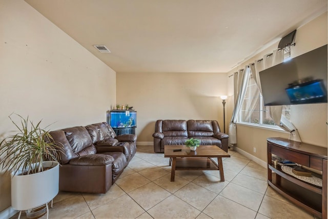 3615 W Sunnyview Ave NW, Visalia, CA 93291 - living area featuring light tile patterned floors and baseboards