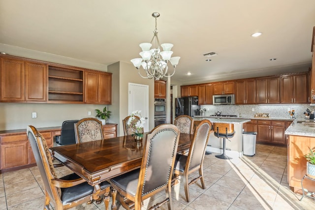 3615 W Sunnyview Ave NW, Visalia, CA 93291 - dining area featuring a chandelier, light tile patterned floors, and recessed lighting