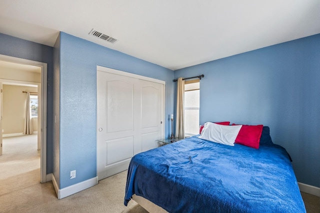 3615 W Sunnyview Ave NW, Visalia, CA 93291 - bedroom with baseboards, carpet floors, and a closet