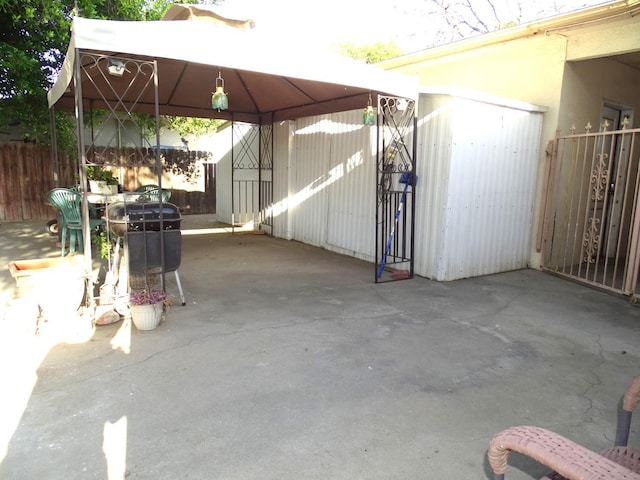 4457 E Brown Ave, Fresno, CA 93703 - view of patio with a carport and a gazebo