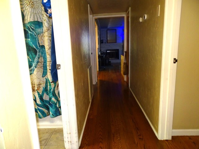 4457 E Brown Ave, Fresno, CA 93703 - corridor with wood finished floors and baseboards