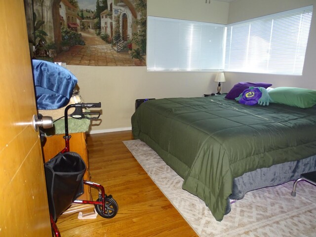 4457 E Brown Ave, Fresno, CA 93703 - bedroom featuring wood finished floors and baseboards