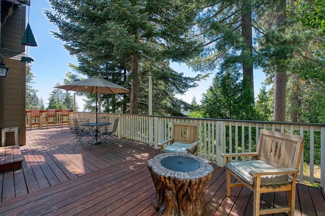 40753 Wild Iris Ln, Shaver Lake, CA 93664 - wooden deck featuring outdoor dining space
