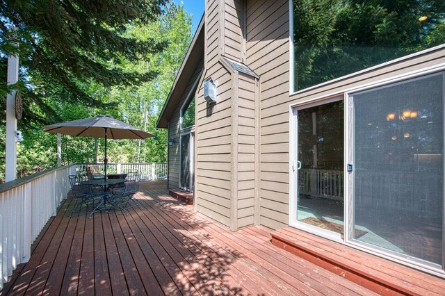 40753 Wild Iris Ln, Shaver Lake, CA 93664 - wooden terrace featuring outdoor dining space