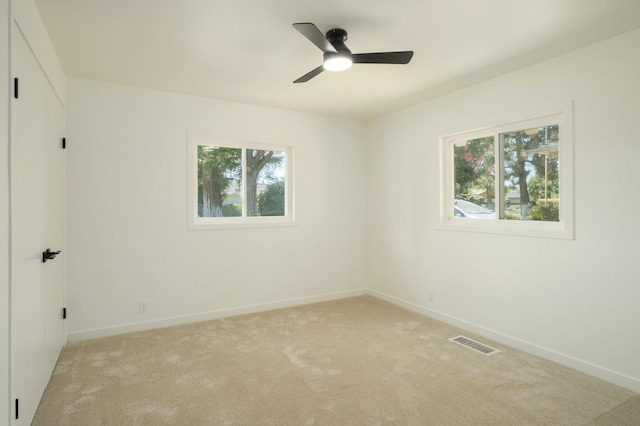 5610 N Arthur Ave, Fresno, CA 93711 - empty room with light colored carpet and a ceiling fan