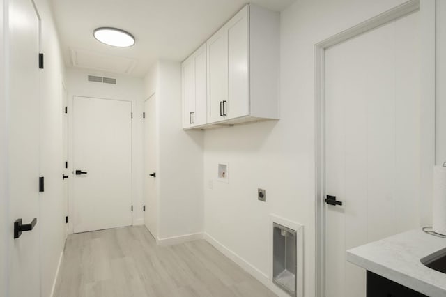 5610 N Arthur Ave, Fresno, CA 93711 - washroom featuring cabinet space, light wood-style flooring, hookup for an electric dryer, hookup for a washing machine, and attic access