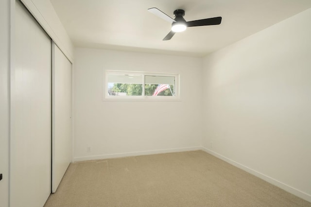 5610 N Arthur Ave, Fresno, CA 93711 - unfurnished bedroom with light carpet, a closet, and a ceiling fan
