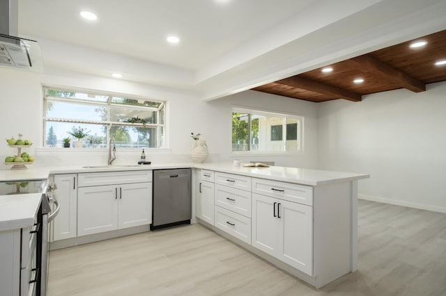 5610 N Arthur Ave, Fresno, CA 93711 - kitchen featuring stainless steel appliances, recessed lighting, light wood-style floors, a peninsula, and a wood ceiling with exposed beams