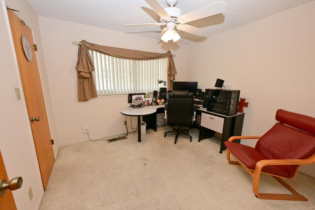 1911 W Simpson Ave, Fresno, CA 93705 - home office with carpet, a textured ceiling, and a ceiling fan